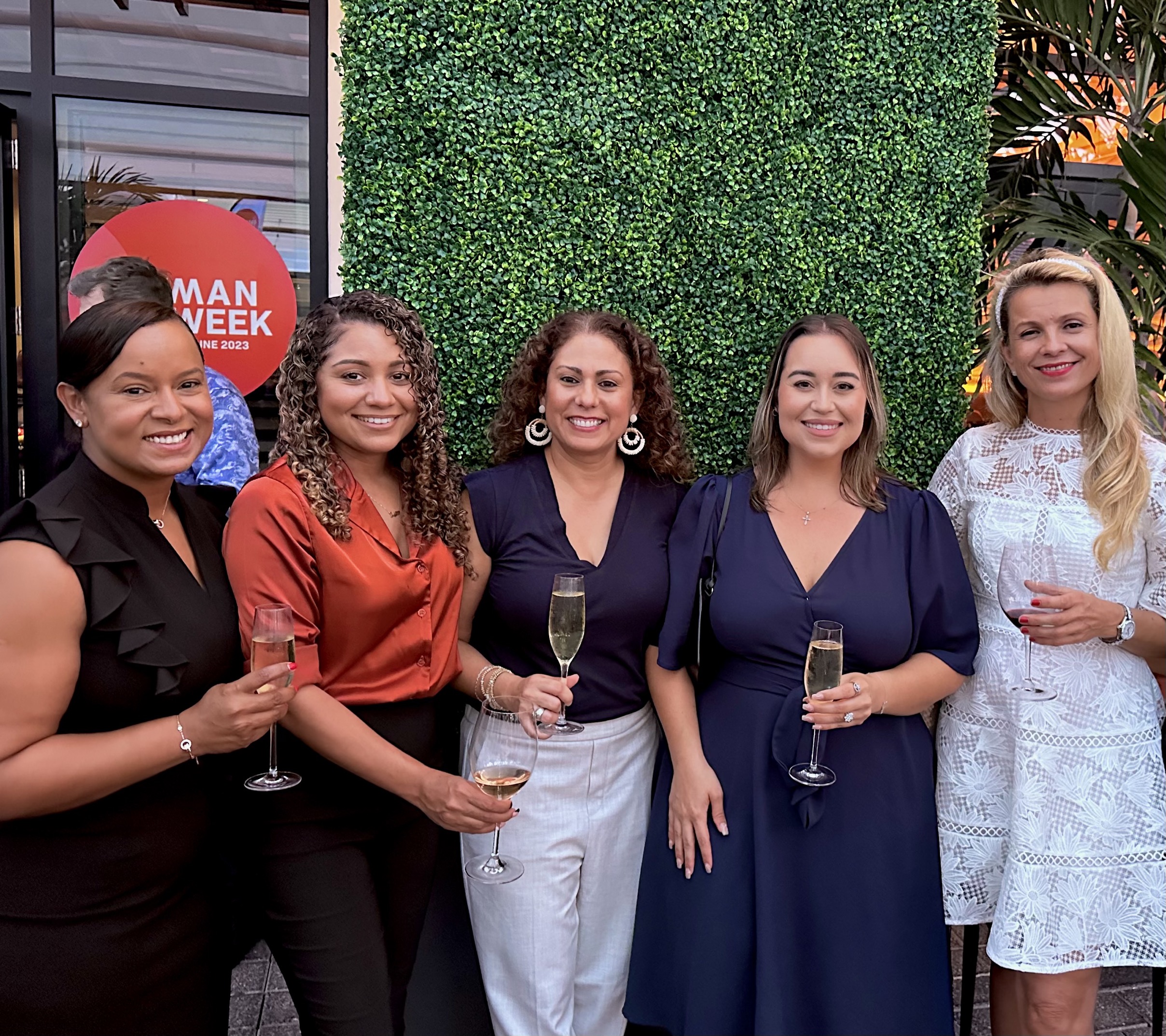 sales team smile for camera