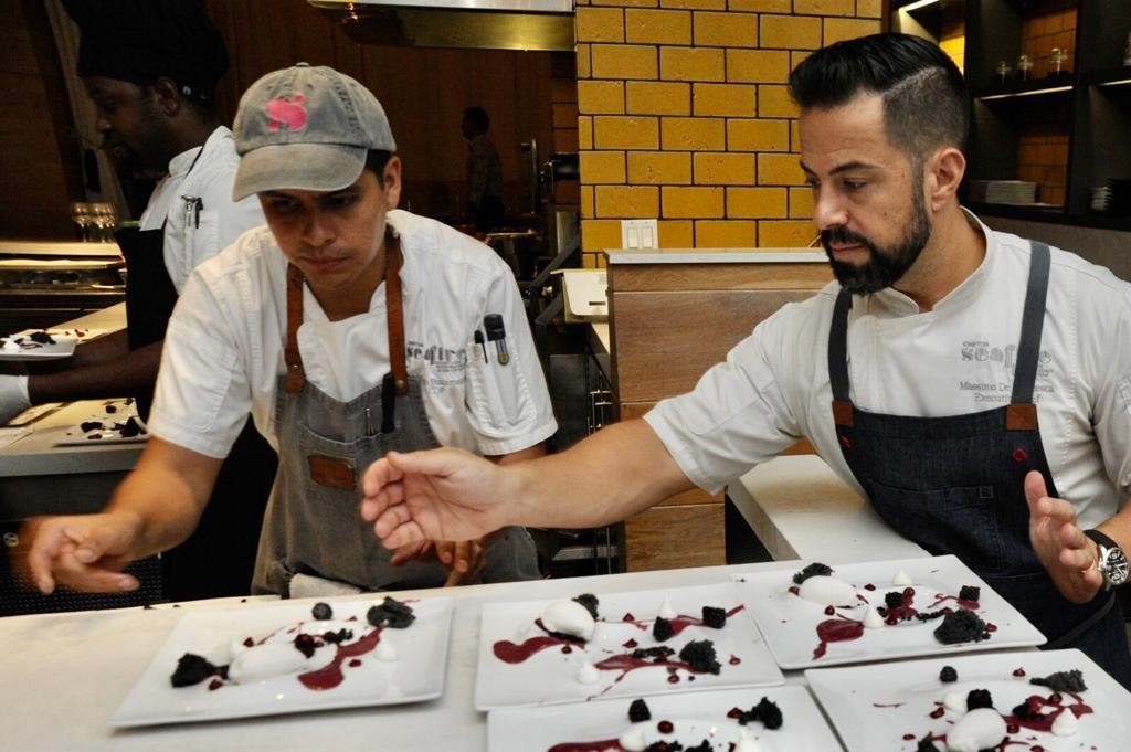 chefs plating food