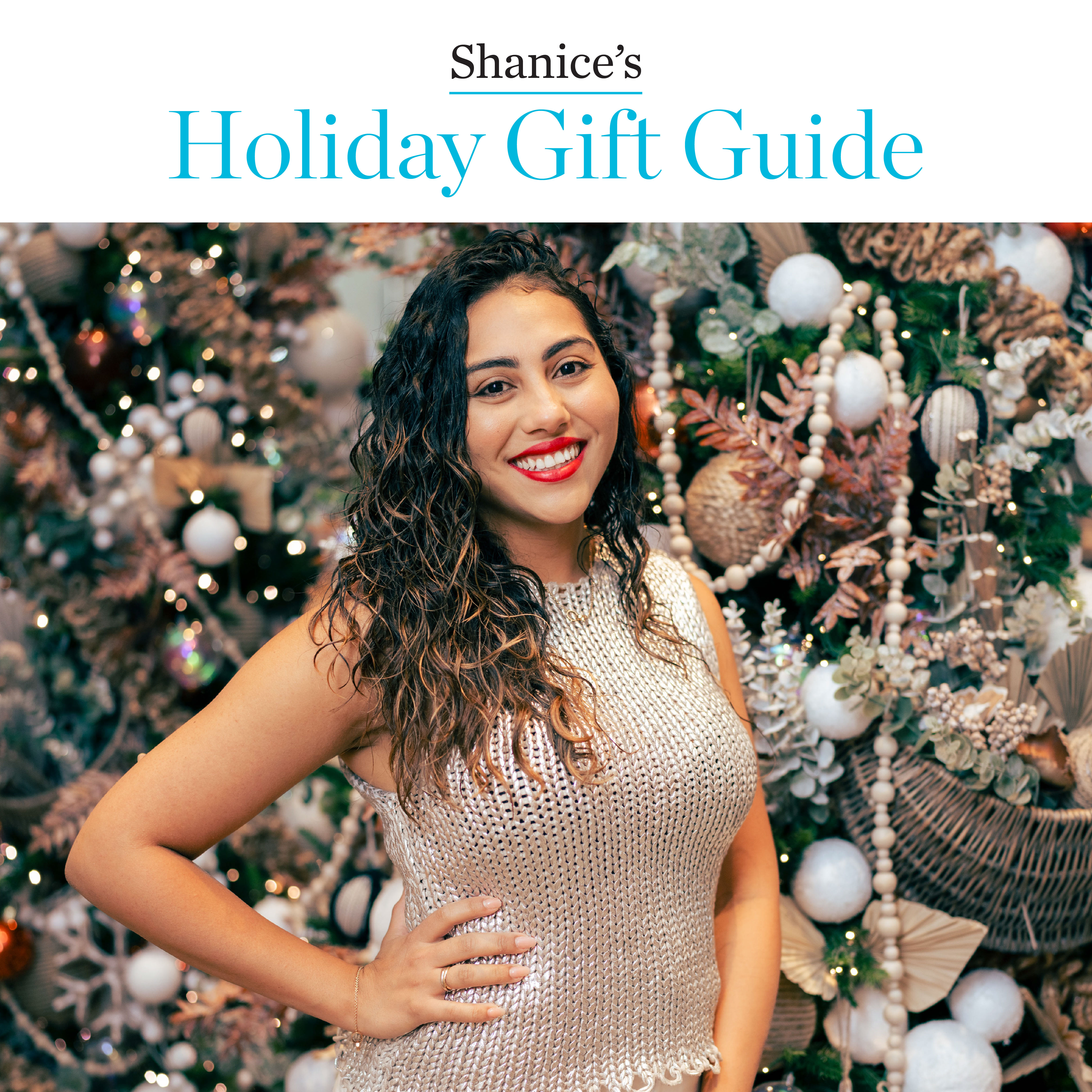 Shanice in front of Christmas tree
